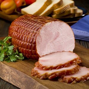 Rebanadas gruesas de jamon de pavo, mostrando una textura más magra